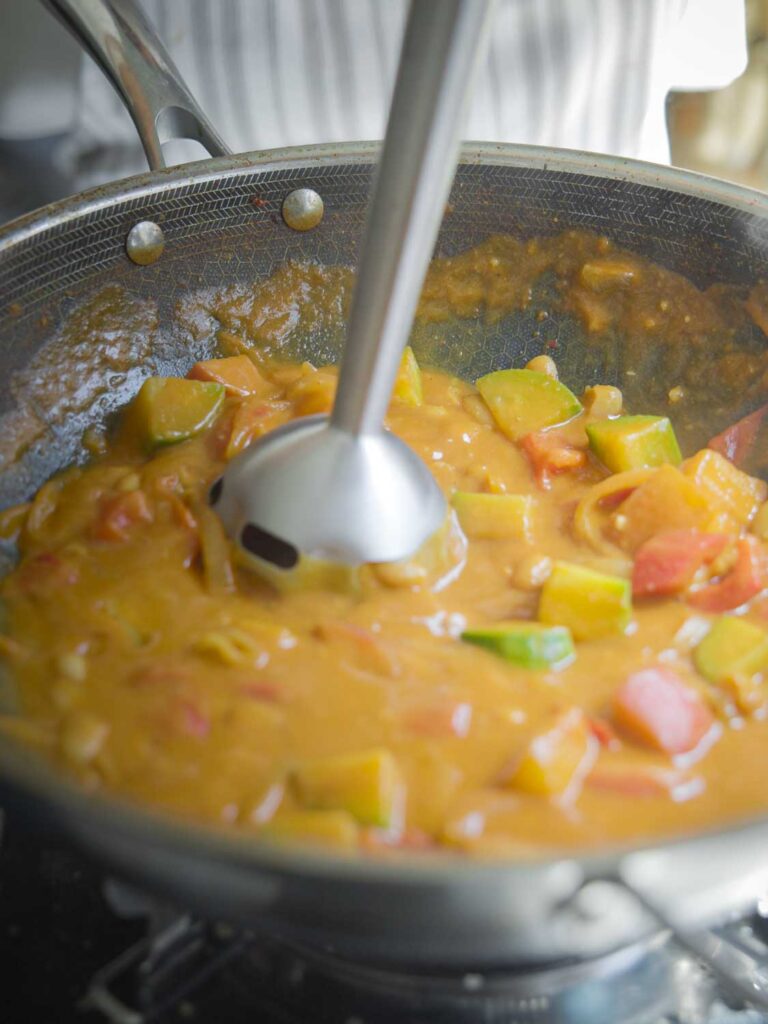 blending curry with immersion blender